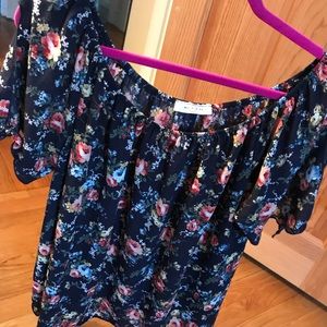 Floral peasant top. The base is navy